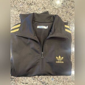 Women’s gently worn Adidas track jacket black and gold